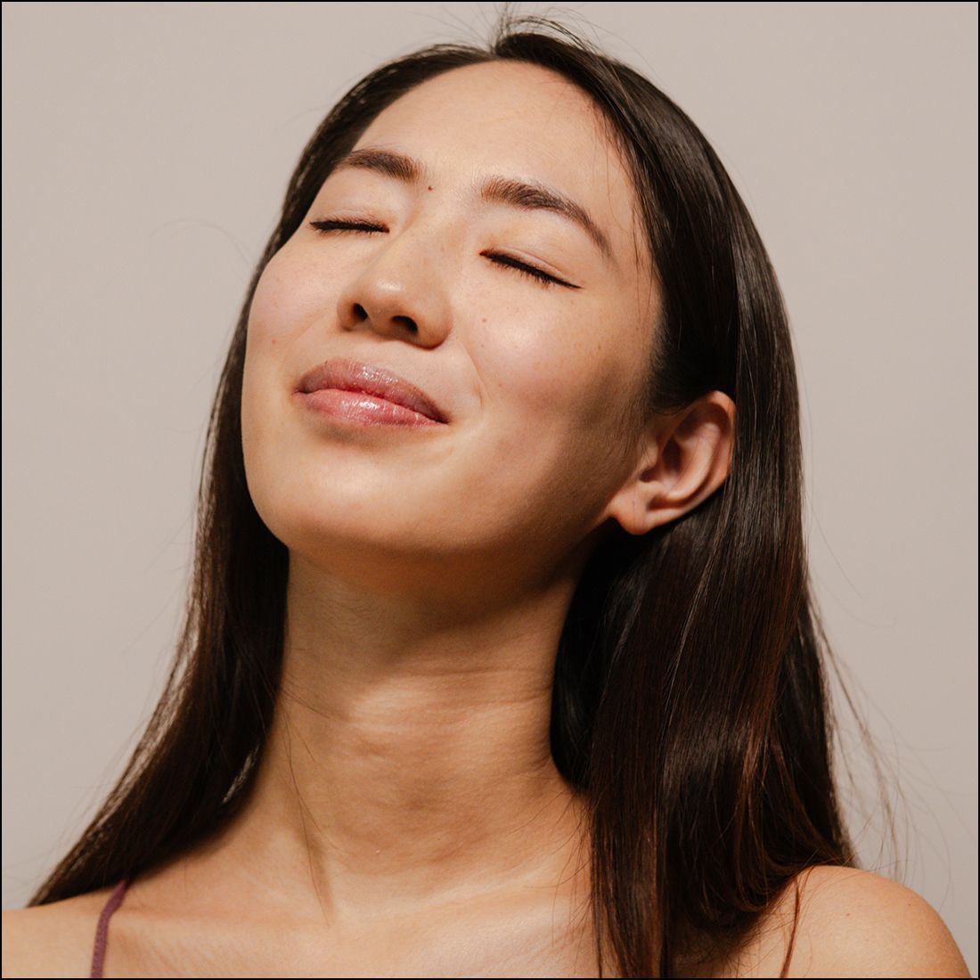 Santa Clara med spa model with closed eyes, serene expression.