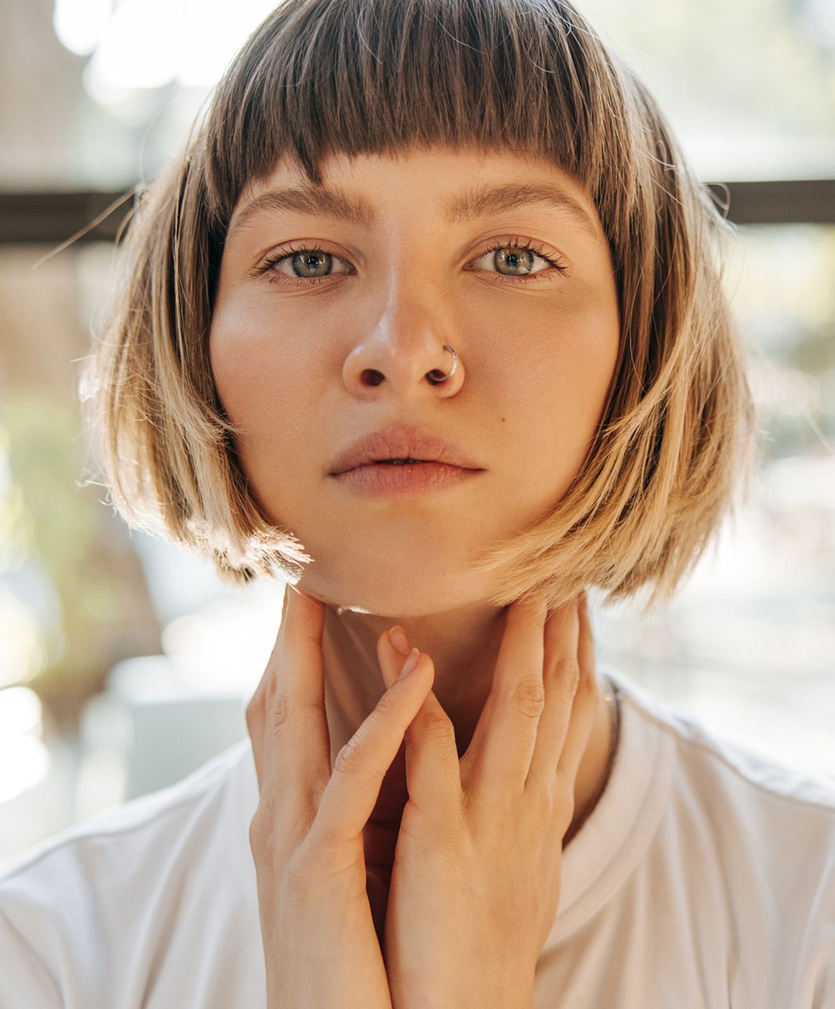Close-up of PRP treatment model with curly hair.