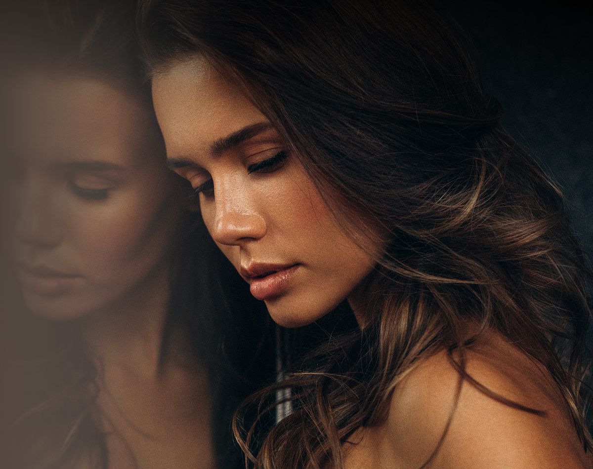 Santa Clara med spa model with long hair in sunlight.