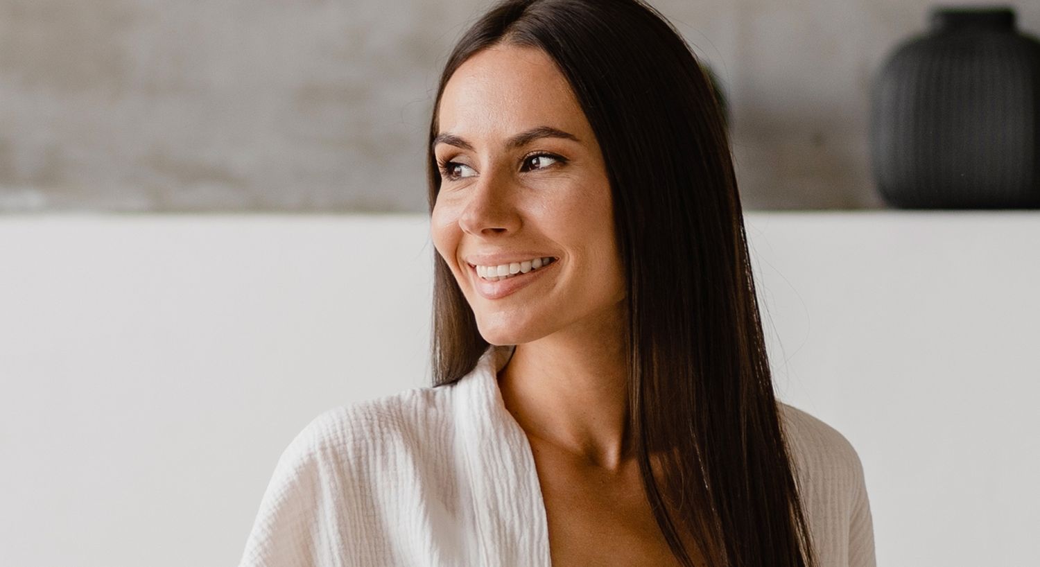 Profile of a facials model with soft lighting.